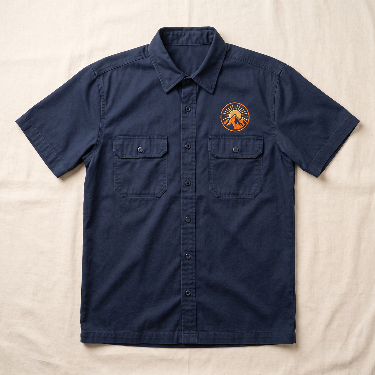 Navy work shirt with embroidered chest logo